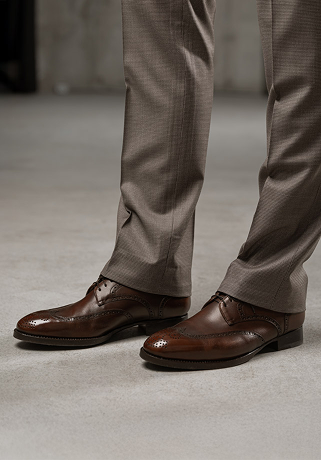 Темно-коричневые брогированные дерби из телячьей кожи